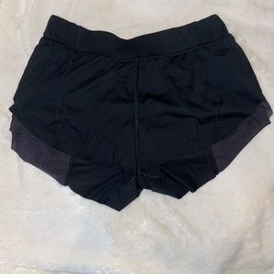 Black Lululemon Layered Running Shorts.